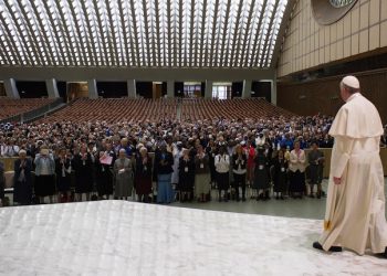 Pope Francis arrives for a special audience with Superiors General of Institutes of Catholic Women Religious in the Paul VI Hall at the Vatican, Thursday, May 12, 2016. Pope Francis said Thursday he is willing to create a commission to study whether women can be deacons in the Catholic Church, signaling an openness to letting women serve in ordained ministry currently reserved to men.  (L'Osservatore Romano/Pool photo via AP)