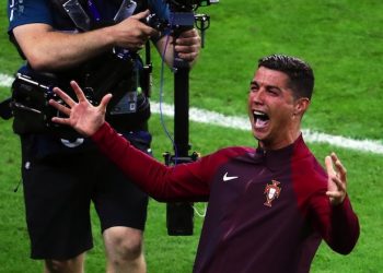 epa05419640 Cristiano Ronaldo of Portugal celebrates after the UEFA EURO 2016 Final match between Portugal and France at Stade de France in Saint-Denis, France, 10 July 2016. Portugal won 1-0 after extra time.

(RESTRICTIONS APPLY: For editorial news reporting purposes only. Not used for commercial or marketing purposes without prior written approval of UEFA. Images must appear as still images and must not emulate match action video footage. Photographs published in online publications (whether via the Internet or otherwise) shall have an interval of at least 20 seconds between the posting.)  EPA/SRDJAN SUKI   EDITORIAL USE ONLY